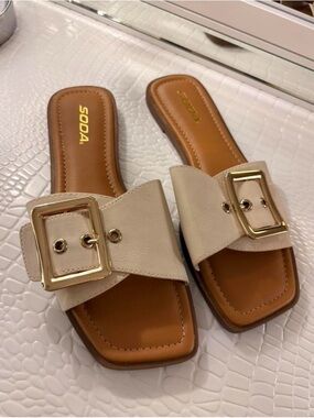 Soda Cream Slide Mules with Gold Buckle